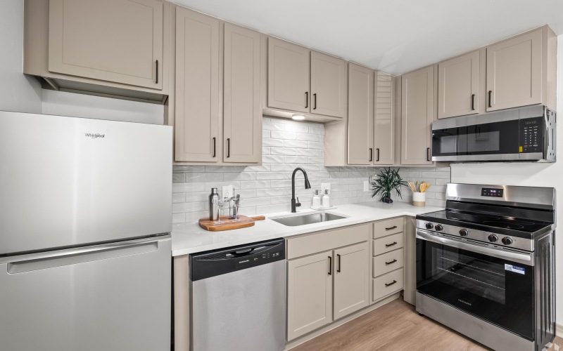 kitchen completely renovated with gorgeous new appliances and backsplash